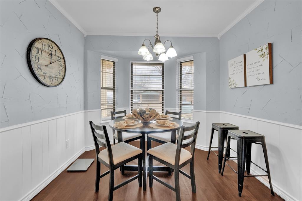 1008 Kay Lynn Street Mansfield, TX 76063 - Photo 7 of 21 a view of a dining room with furniture window and wooden floor