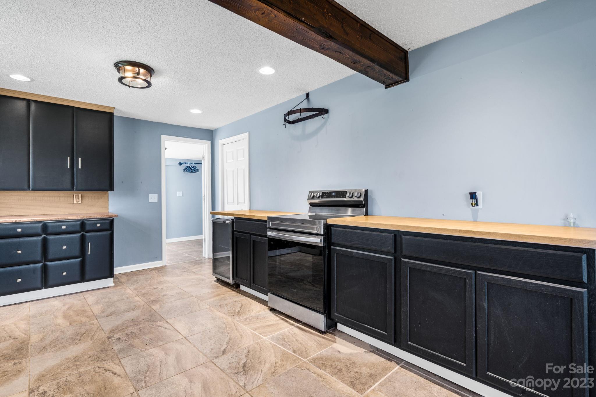 515 Salem Road Morganton, NC 28655 - Photo 6 of 33 a kitchen with a sink and cabinets