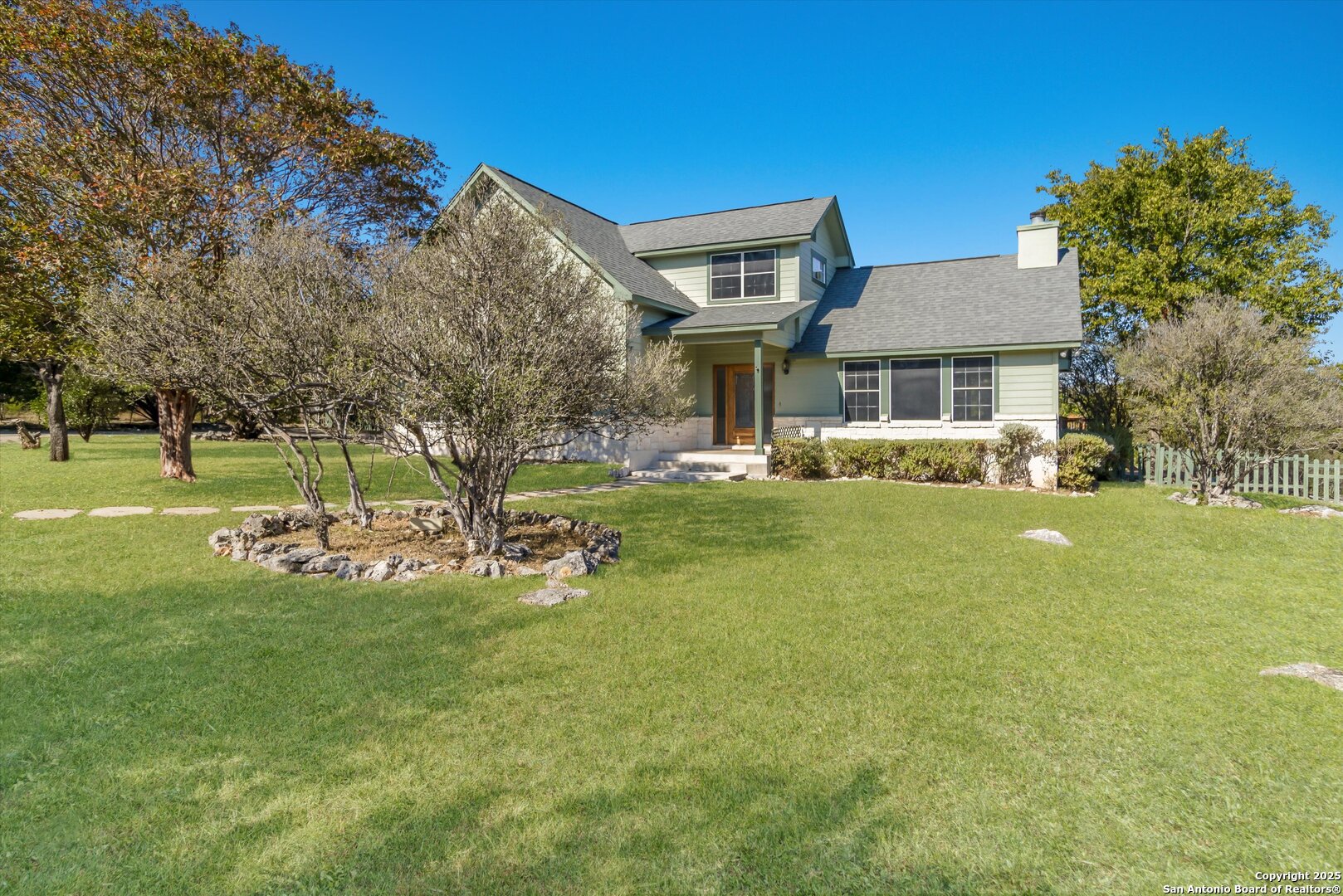a front view of house with yard