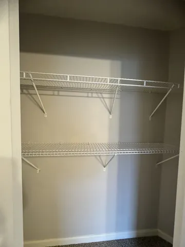 a view of a room with racks on the wall