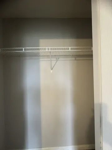 a view of a room with racks on the wall