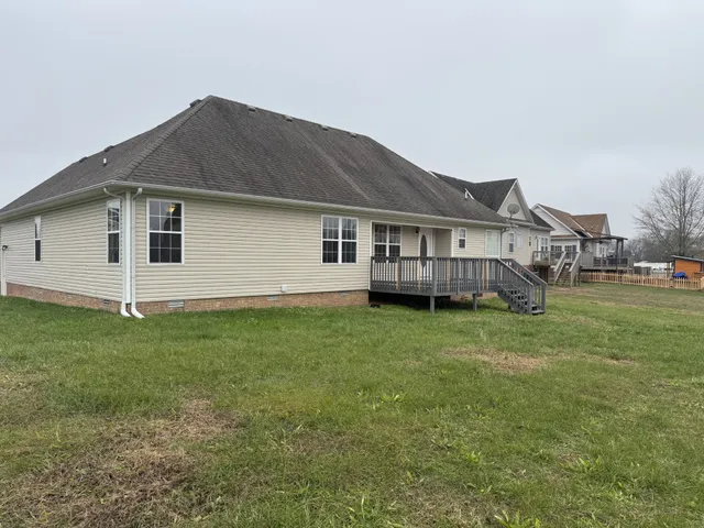a view of a house with a big yard