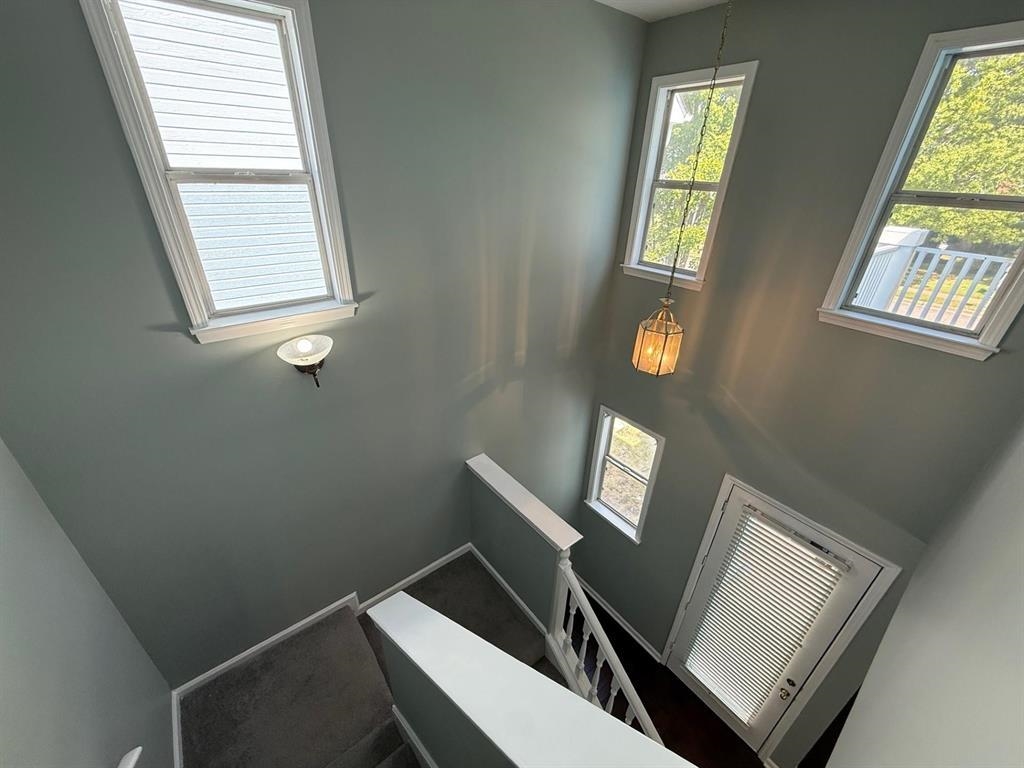 1173 Island Place East Memphis, TN 38103 - Photo 10 of 18 Staircase featuring plenty of natural light and a high ceiling