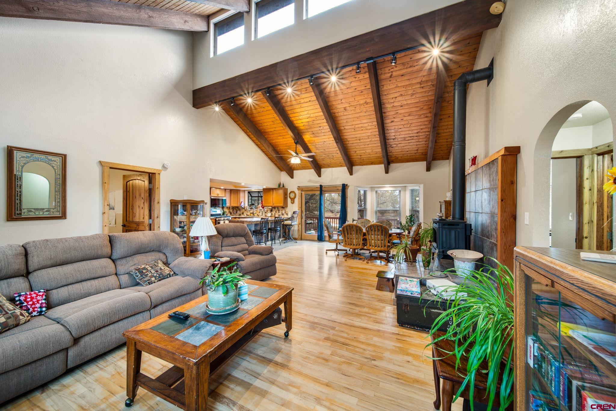 136 Oak Drive Durango, CO 81301 - Photo 6 of 29 a living room with furniture and a large window