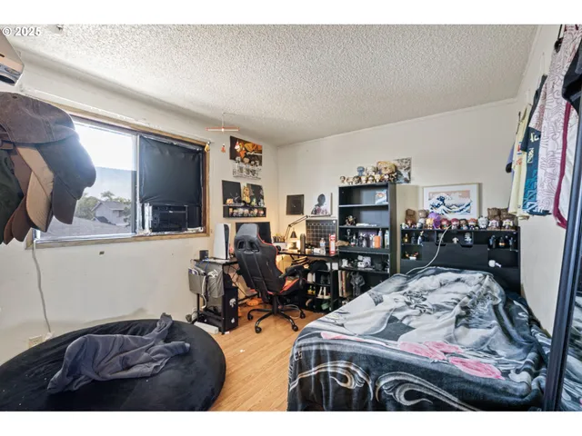 a bedroom with a bed and a walk in closet