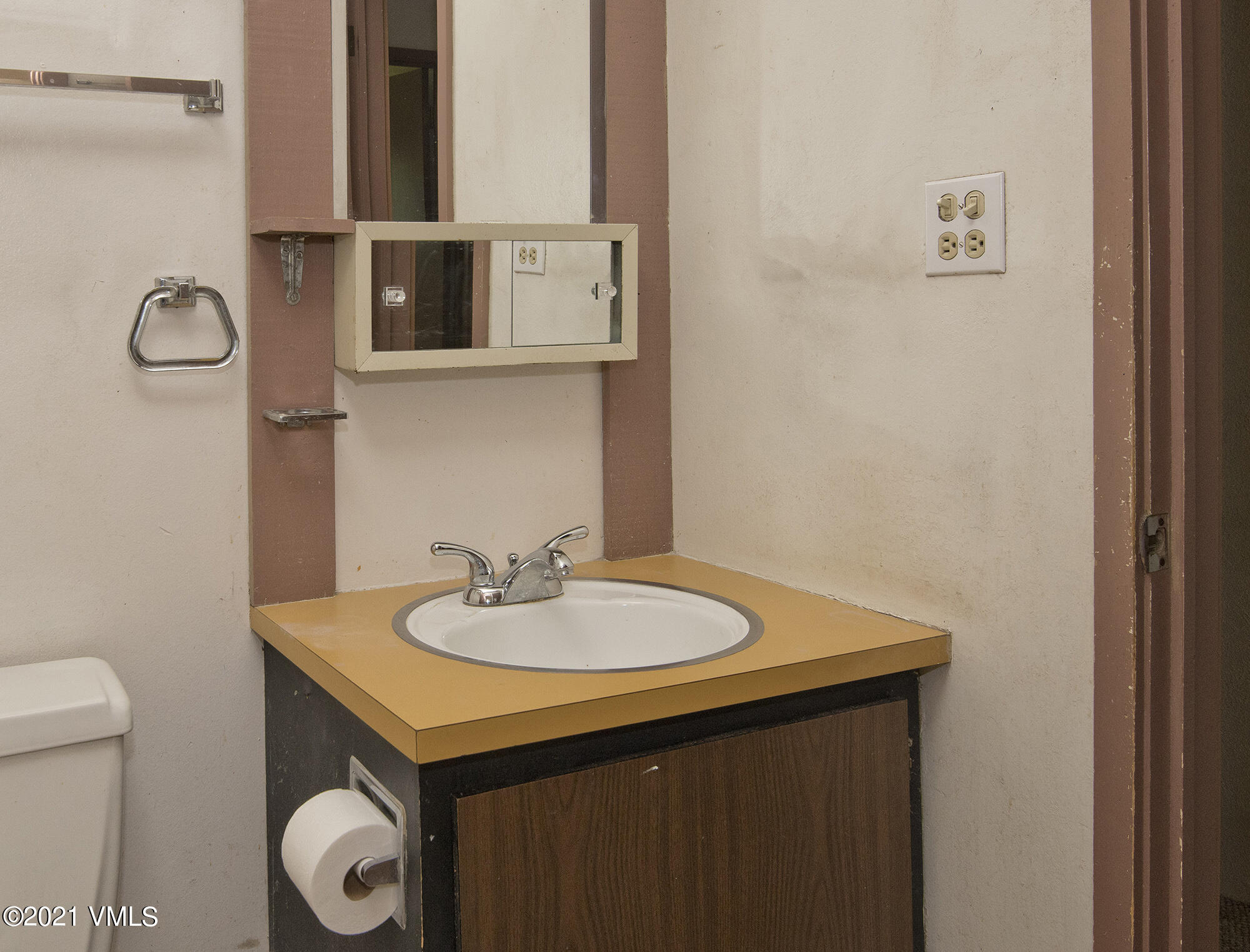 4506 Spruce Way, Unit 4 Vail, CO 81657 - Photo 11 of 31 a bathroom with a sink vanity and toilet