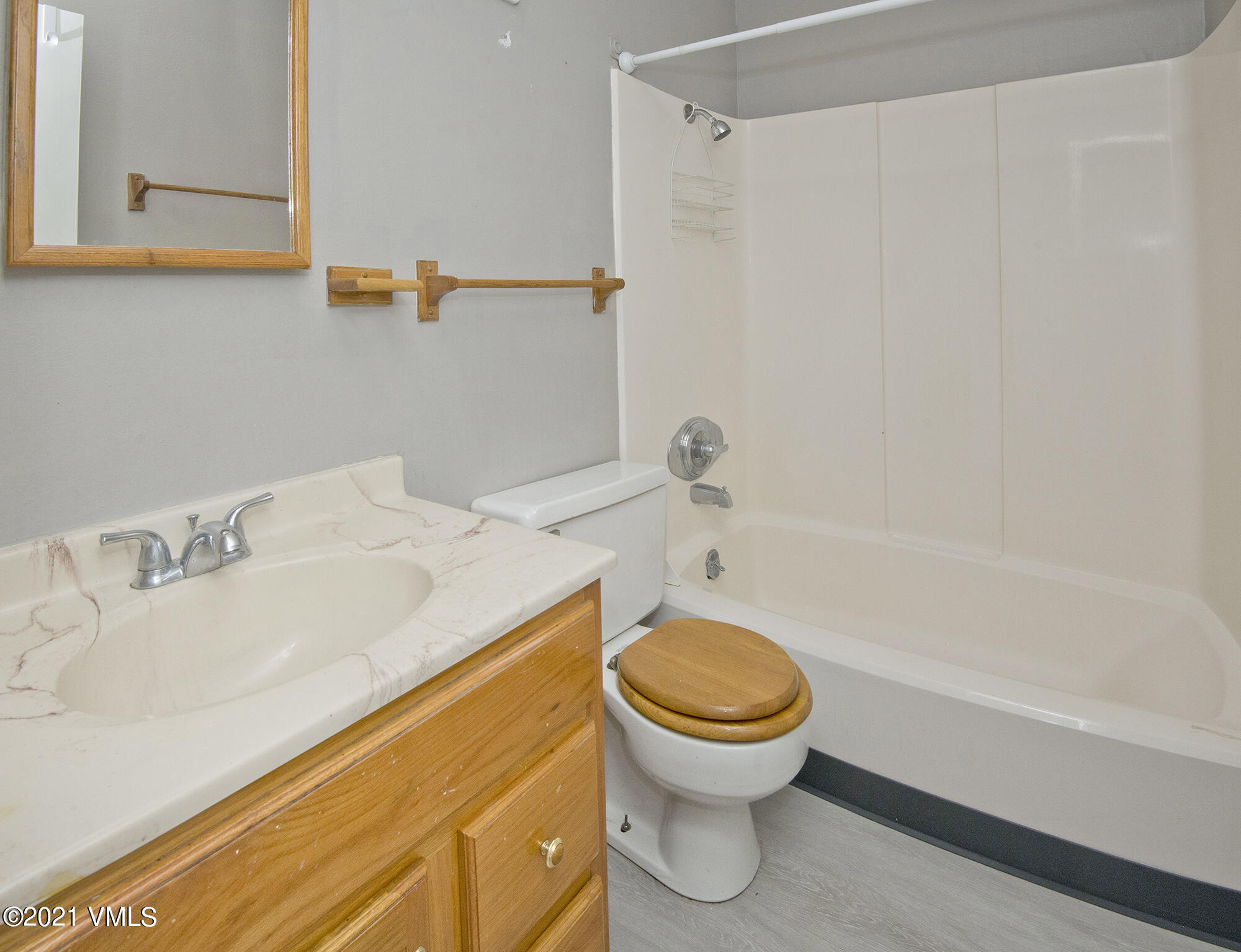 4506 Spruce Way, Unit 4 Vail, CO 81657 - Photo 19 of 31 a bathroom with a sink and a toilet