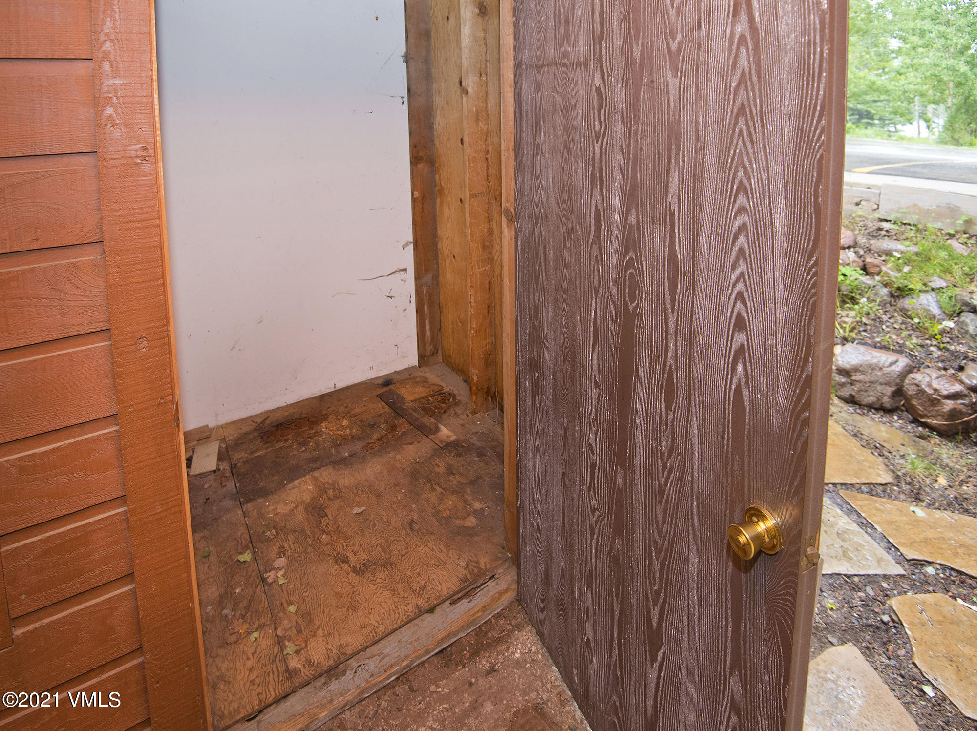 4506 Spruce Way, Unit 4 Vail, CO 81657 - Photo 23 of 31 a view of a wooden door