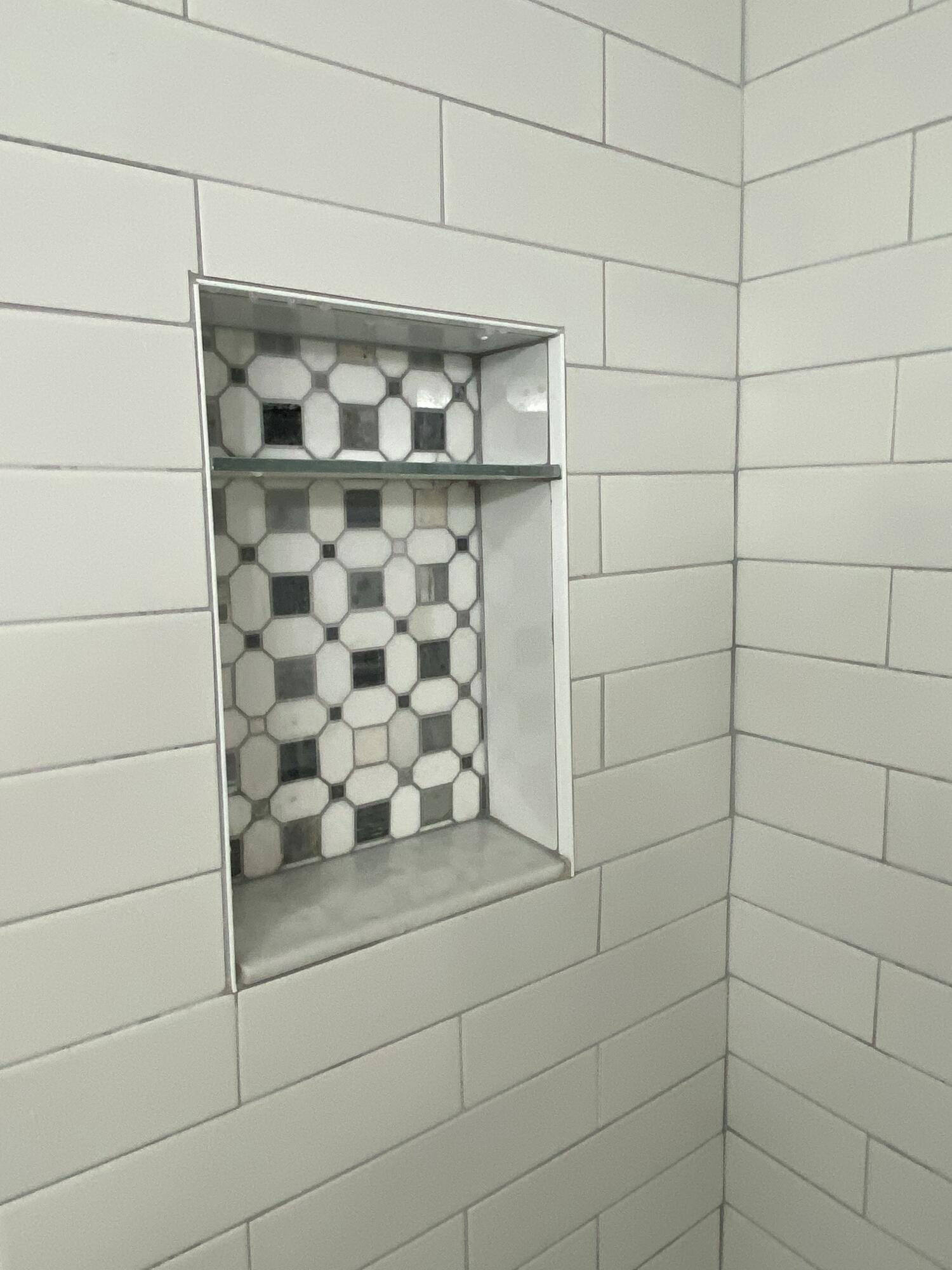 342 Mansfield Drive, Unit I Boca Raton, FL 33434 - Photo 11 of 17 a bathroom with a shower