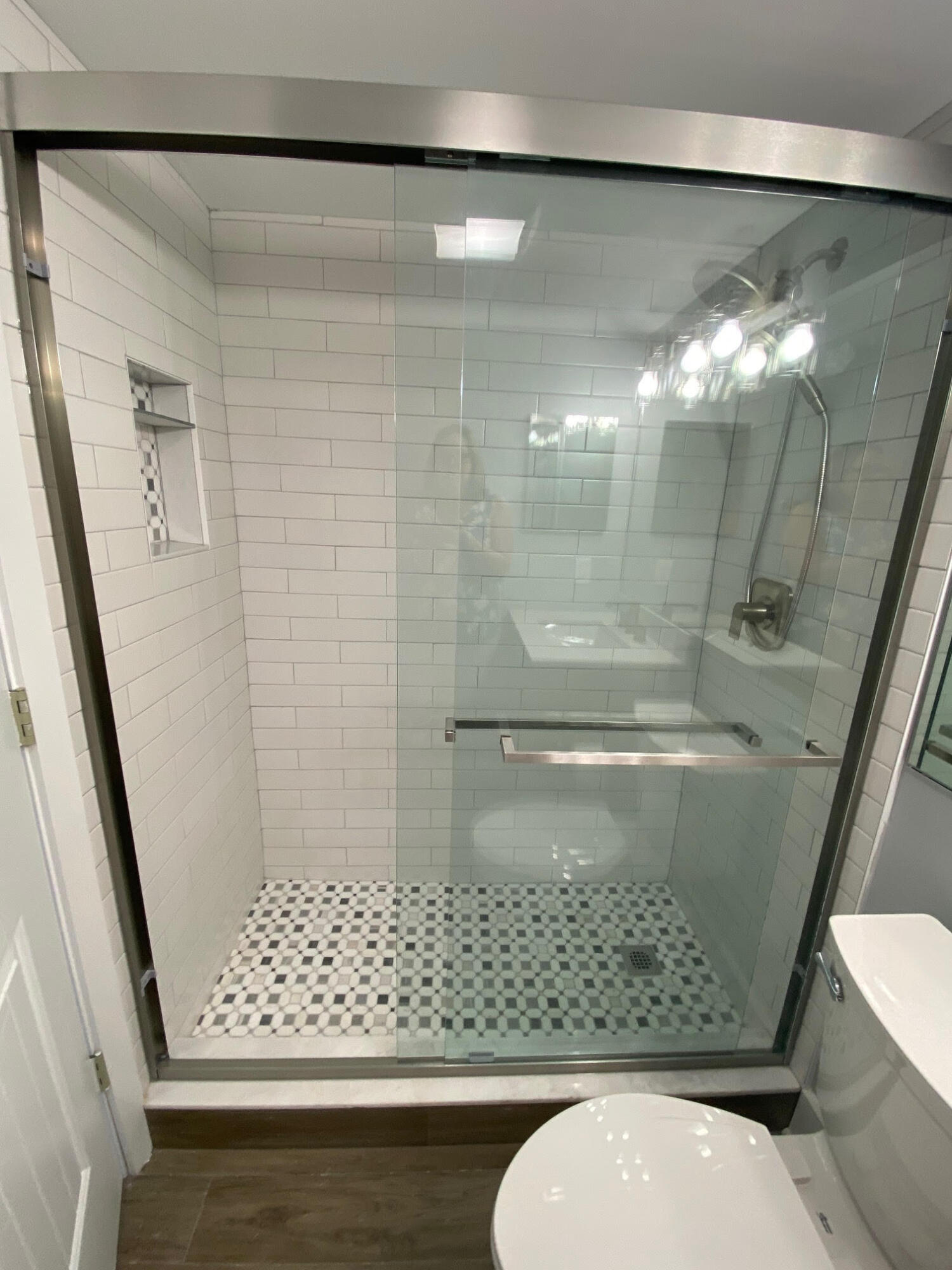 342 Mansfield Drive, Unit I Boca Raton, FL 33434 - Photo 12 of 17 a bathroom with a shower