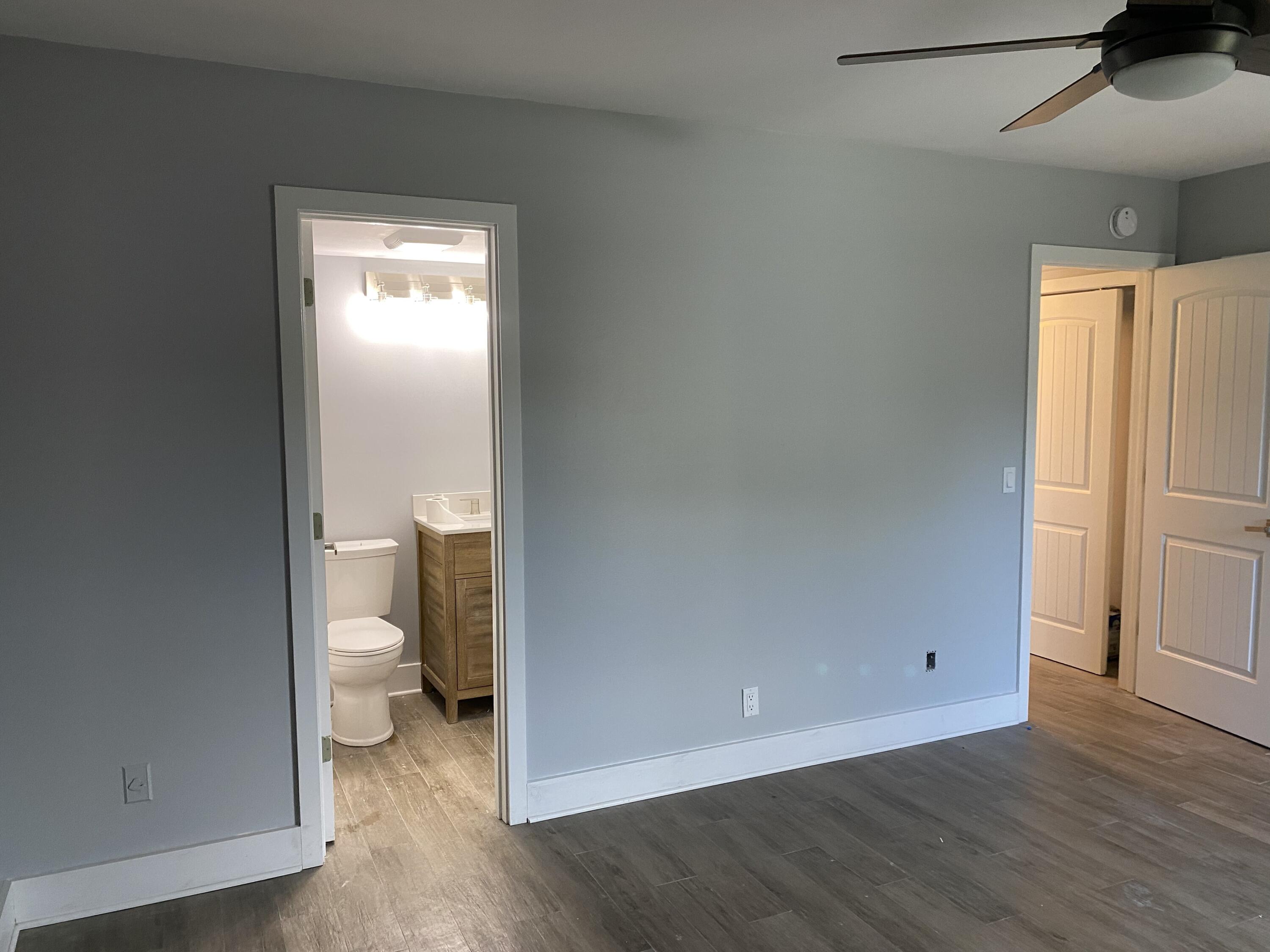 342 Mansfield Drive, Unit I Boca Raton, FL 33434 - Photo 6 of 17 a view of a bathroom with a toilet