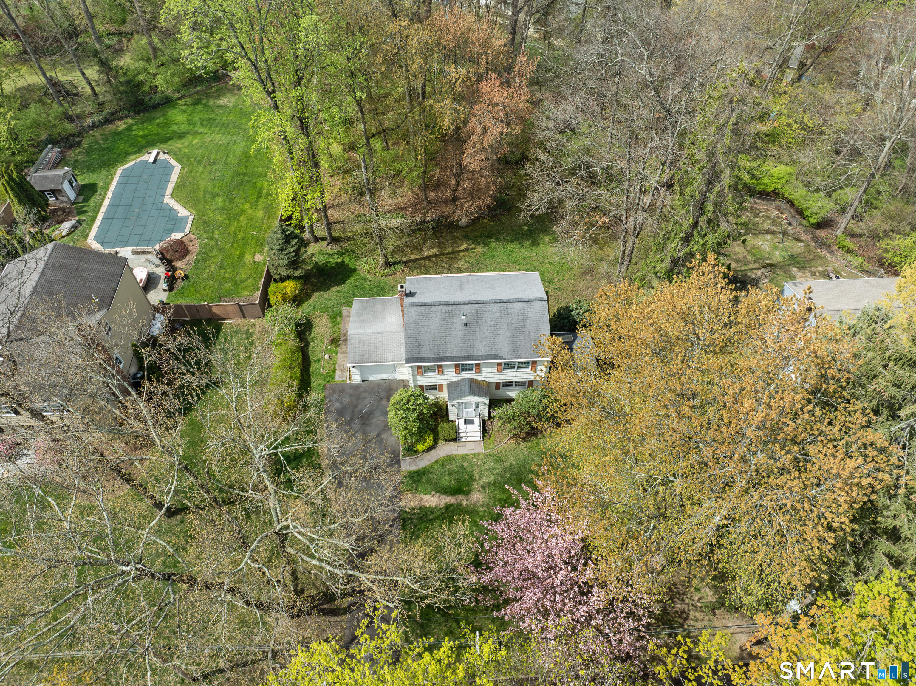251 Shelter Rock Road Fairfield, CT 06825 - Photo 2 of 38 an aerial view of a house with a yard