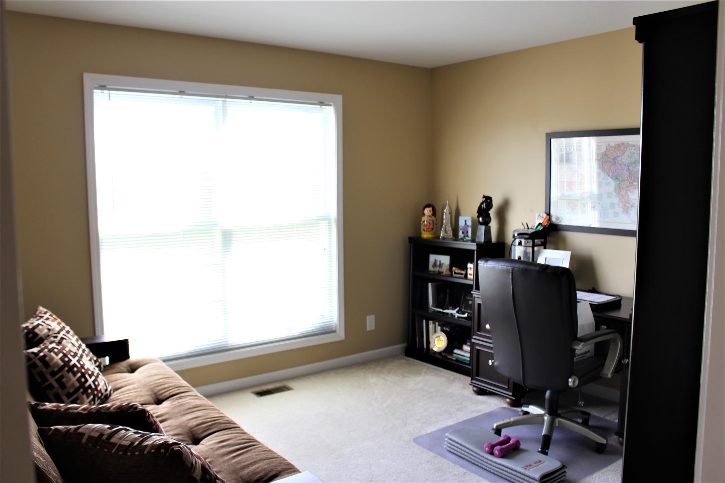 2220 Kinneys Road Cedar Hill, TN 37032 - Photo 18 of 23 a living room with furniture and a window