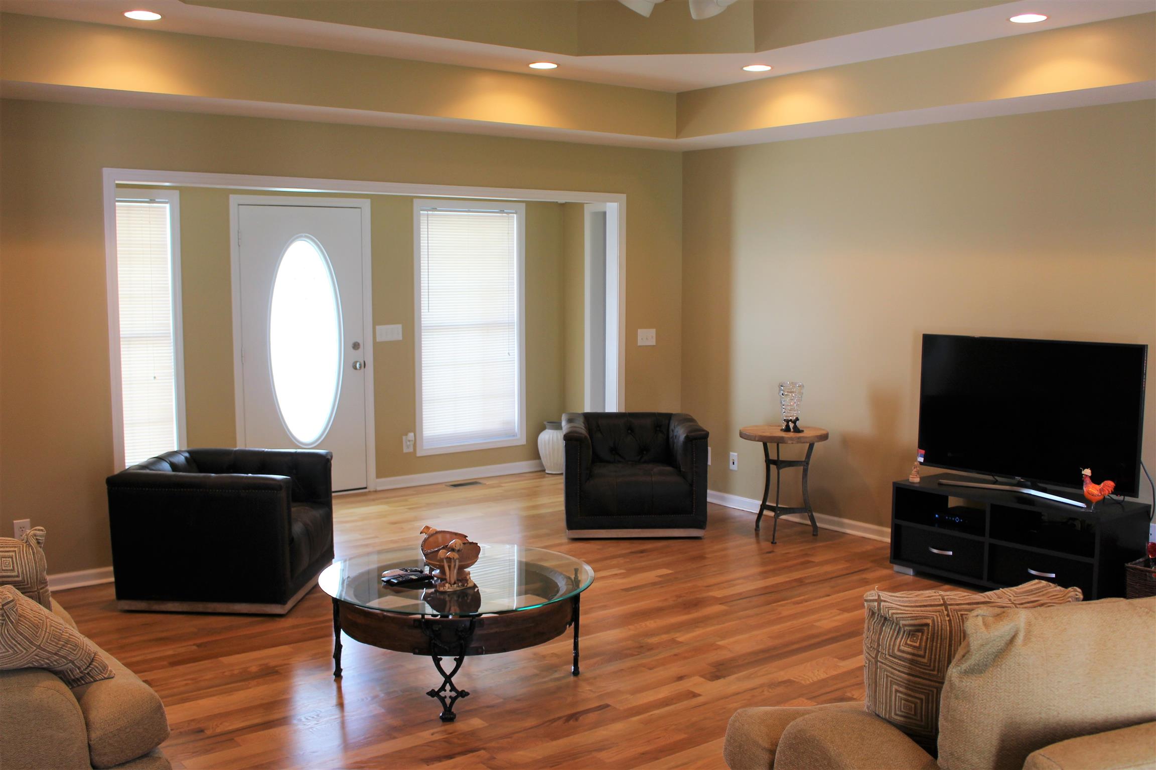 2220 Kinneys Road Cedar Hill, TN 37032 - Photo 5 of 23 a living room with furniture and a flat screen tv