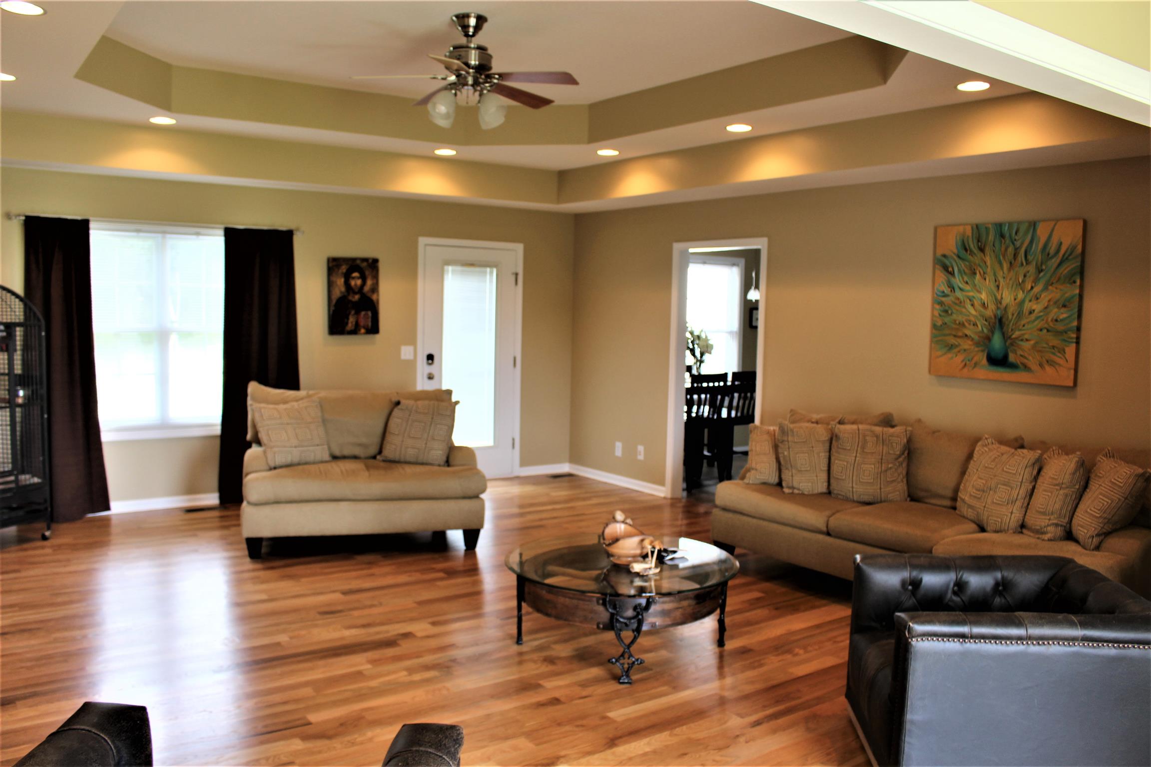 2220 Kinneys Road Cedar Hill, TN 37032 - Photo 6 of 23 a living room with furniture and wooden floor