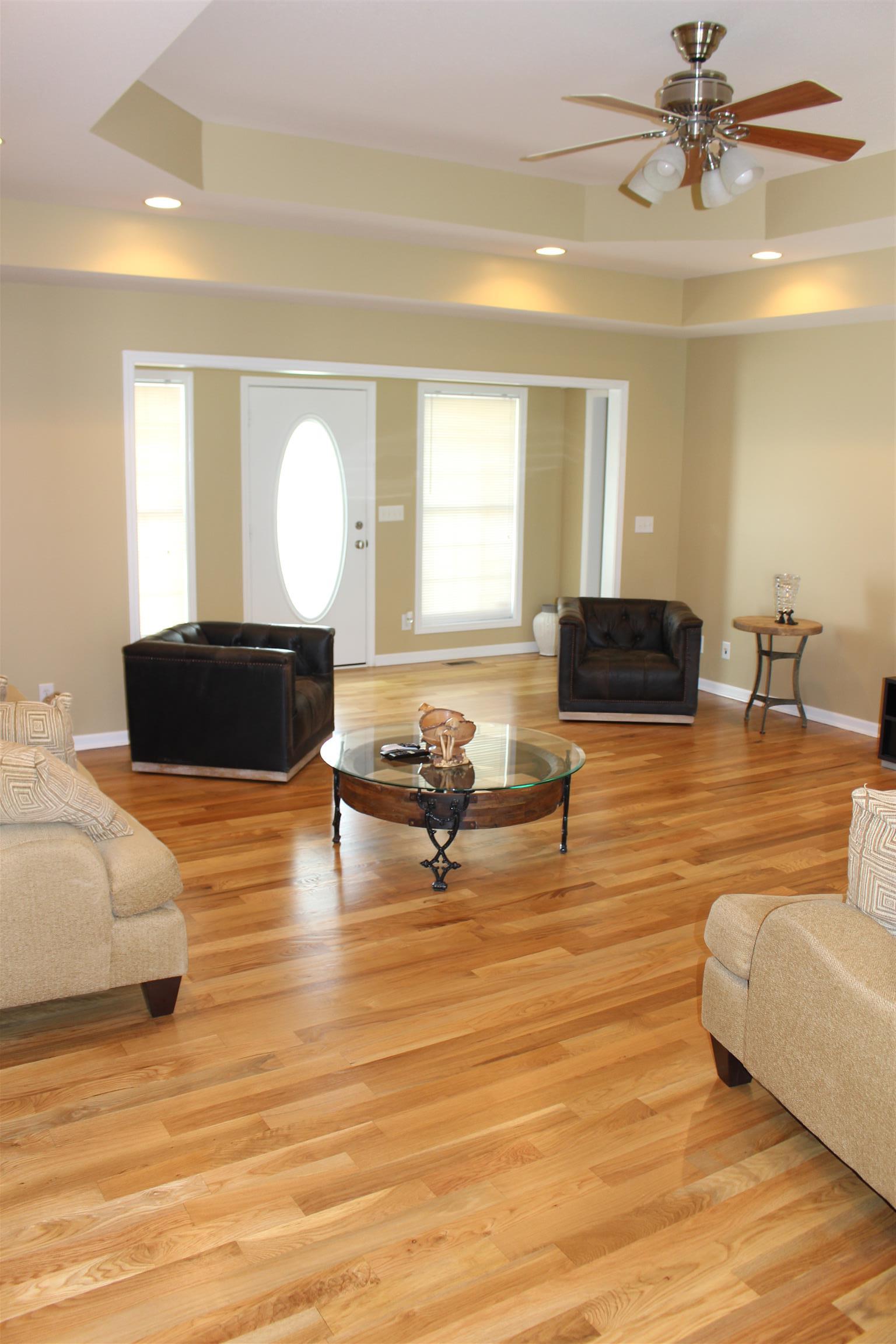 2220 Kinneys Road Cedar Hill, TN 37032 - Photo 7 of 23 a living room with furniture and a large mirror