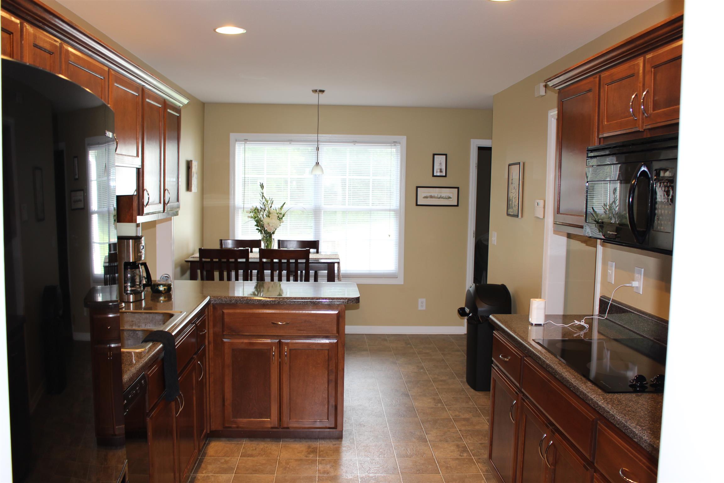 2220 Kinneys Road Cedar Hill, TN 37032 - Photo 10 of 23 a kitchen with granite countertop lots of counter top space