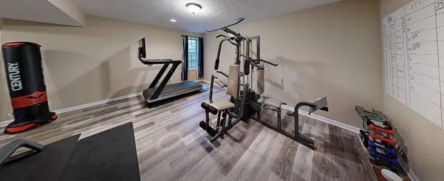 a view of a room with gym equipment