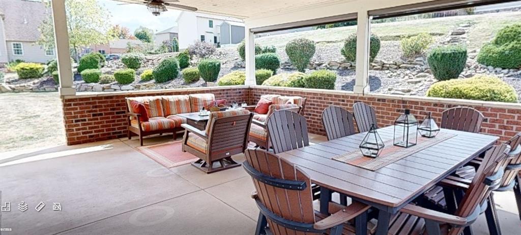150 Eric Drive Beaver, PA 15009 - Photo 31 of 35 a view of a chairs and table in the patio