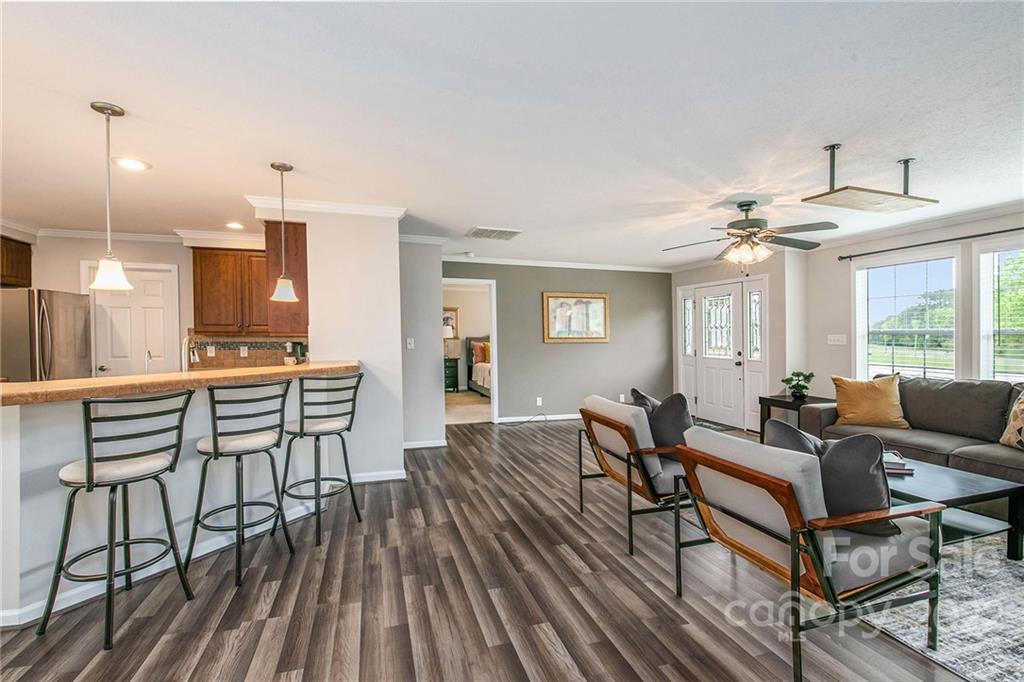 6130 Long Ferry Road Salisbury, NC 28146 - Photo 12 of 32 a living room with furniture and wooden floor