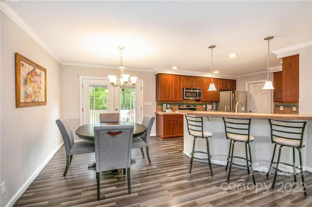 6130 Long Ferry Road Salisbury, NC 28146 - Photo 13 of 32 a view of a dining room with furniture window and outside view