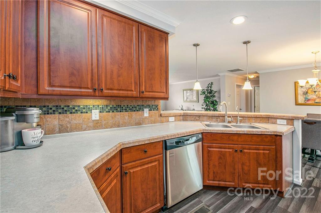 6130 Long Ferry Road Salisbury, NC 28146 - Photo 15 of 32 a kitchen with a sink cabinets and window