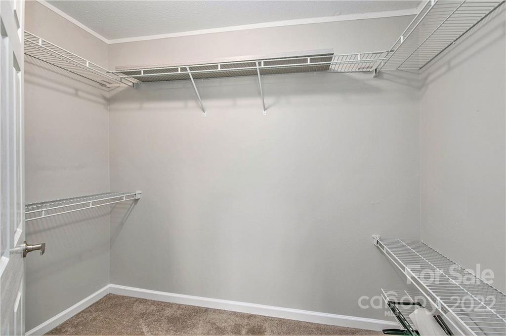 6130 Long Ferry Road Salisbury, NC 28146 - Photo 22 of 32 a view of a room with racks on the wall