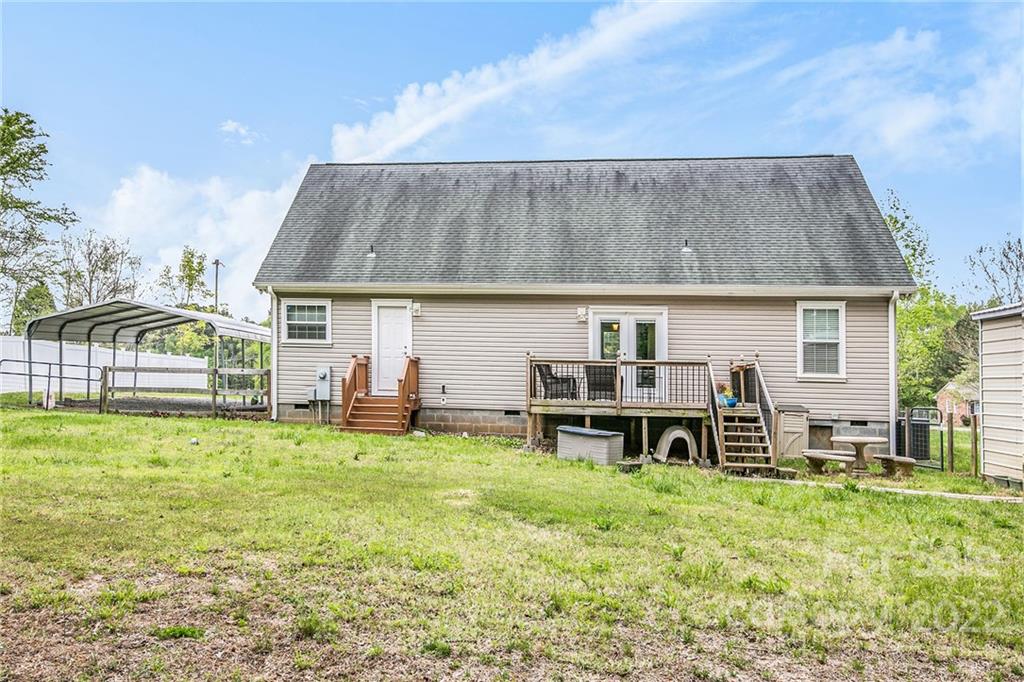 6130 Long Ferry Road Salisbury, NC 28146 - Photo 27 of 32 a view of a house with backyard porch and sitting area