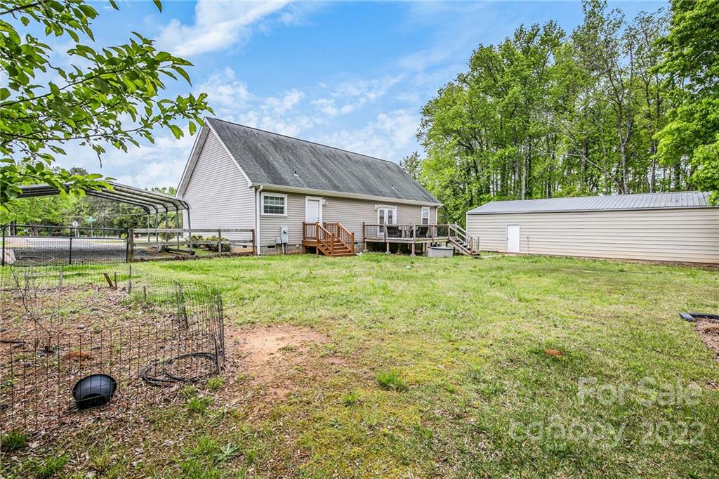 6130 Long Ferry Road Salisbury, NC 28146 - Photo 29 of 32 a view of a house with backyard and a tree