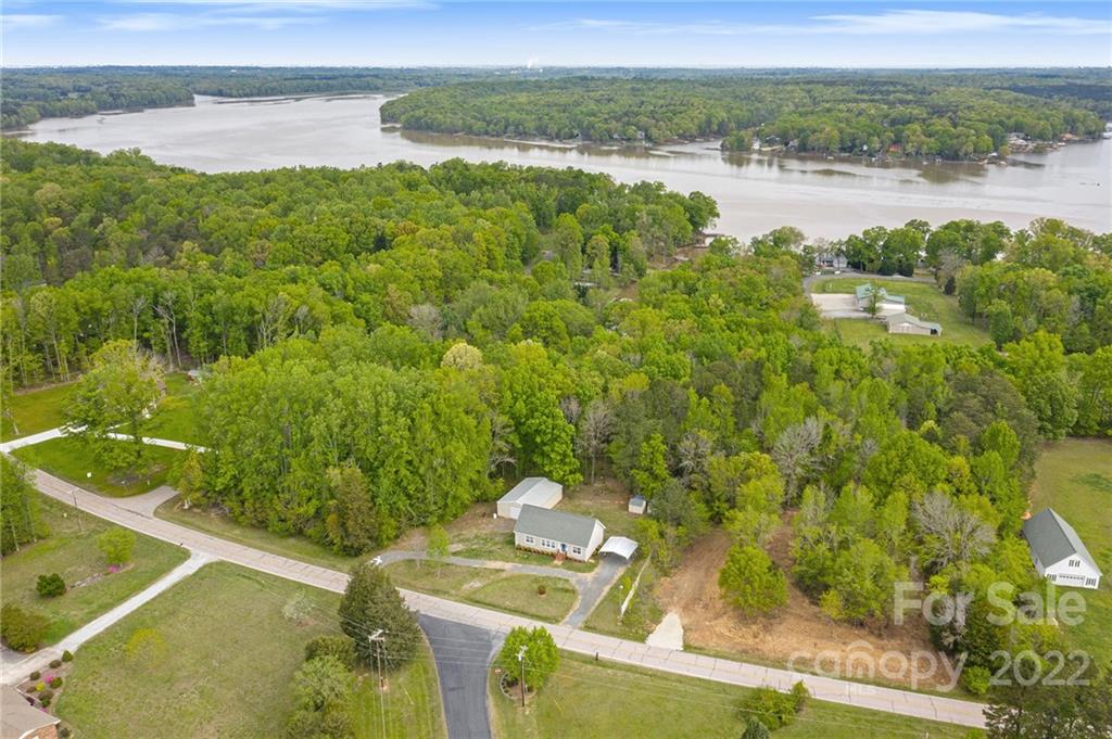 6130 Long Ferry Road Salisbury, NC 28146 - Photo 31 of 32 a view of a lake with a mountain