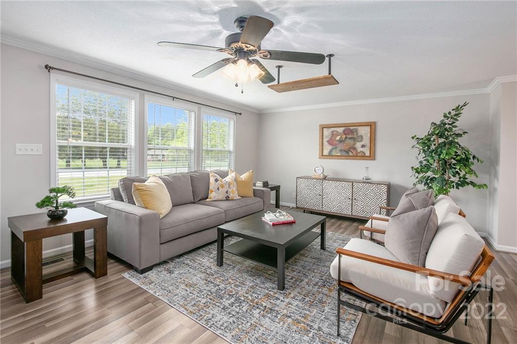 6130 Long Ferry Road Salisbury, NC 28146 - Photo 6 of 32 a living room with furniture and a large window