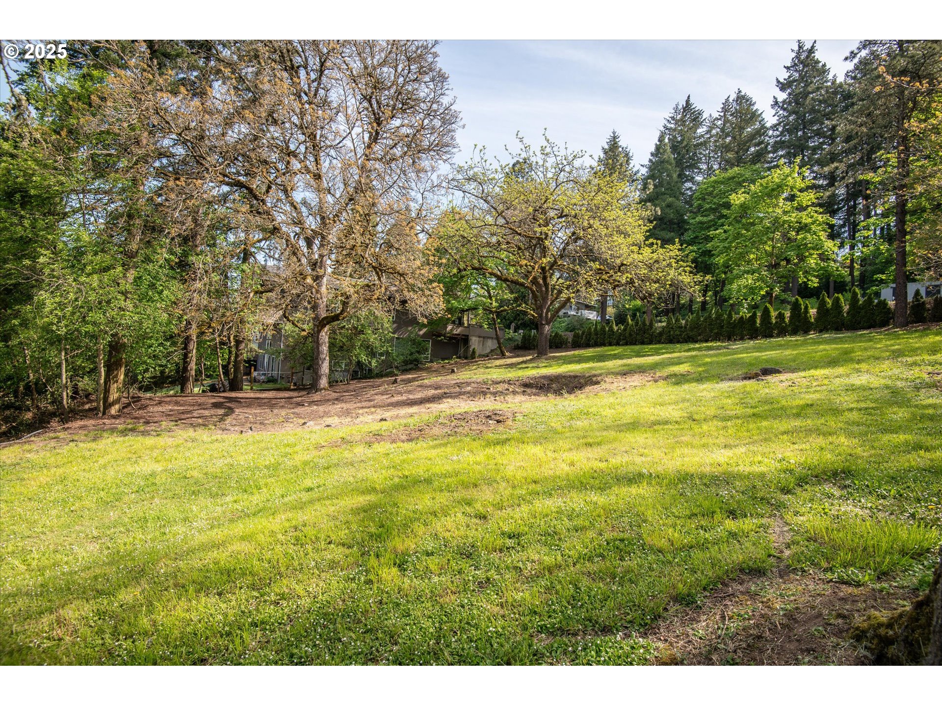 0 Crenshaw Road Eugene, OR 97401 - Photo 13 of 35 a view of a swimming pool with an outdoor space and seating area