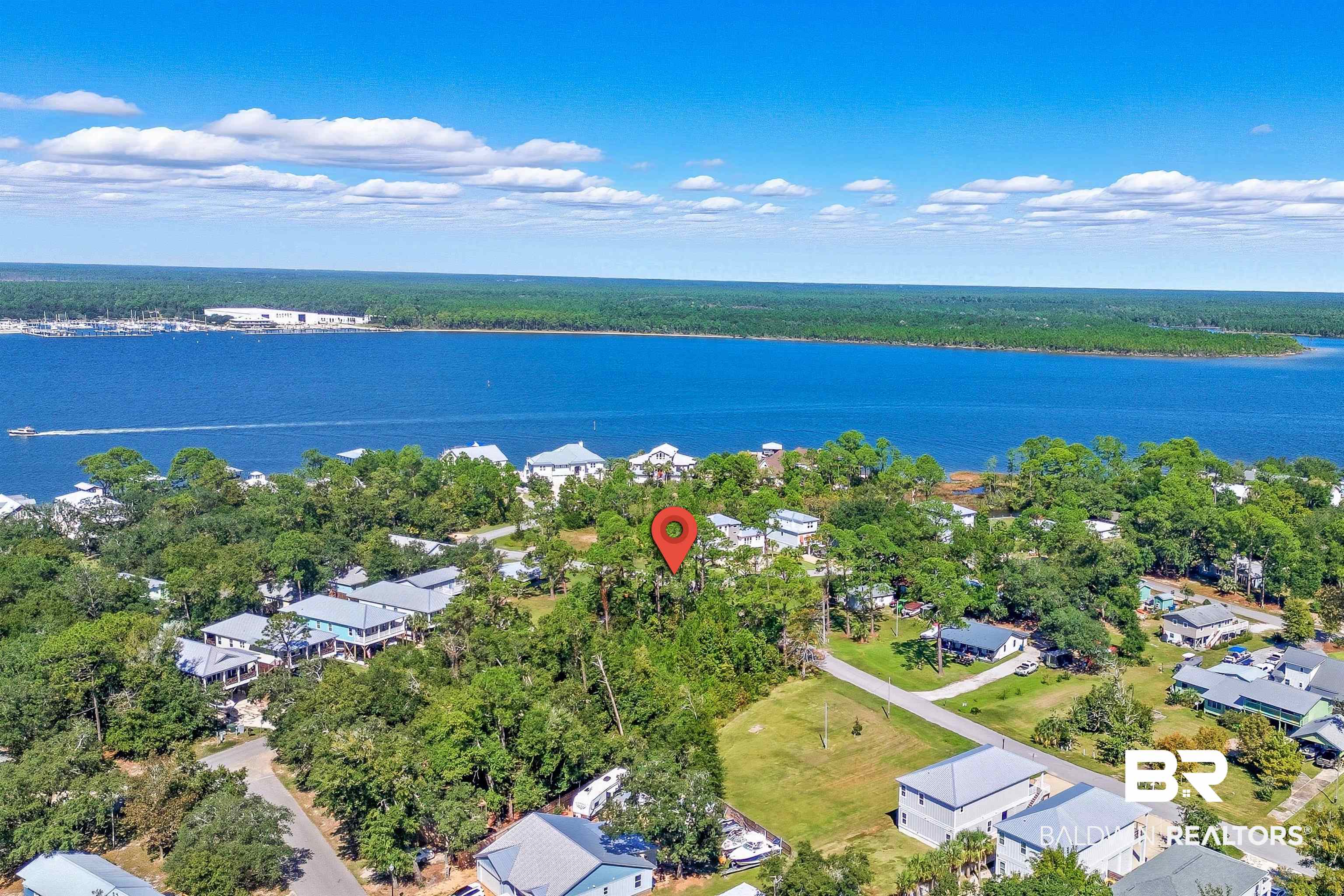 5310 Pine Road Orange Beach, AL 36561 - Photo 4 of 46 Aerial view of residential area featuring a nearby body of water