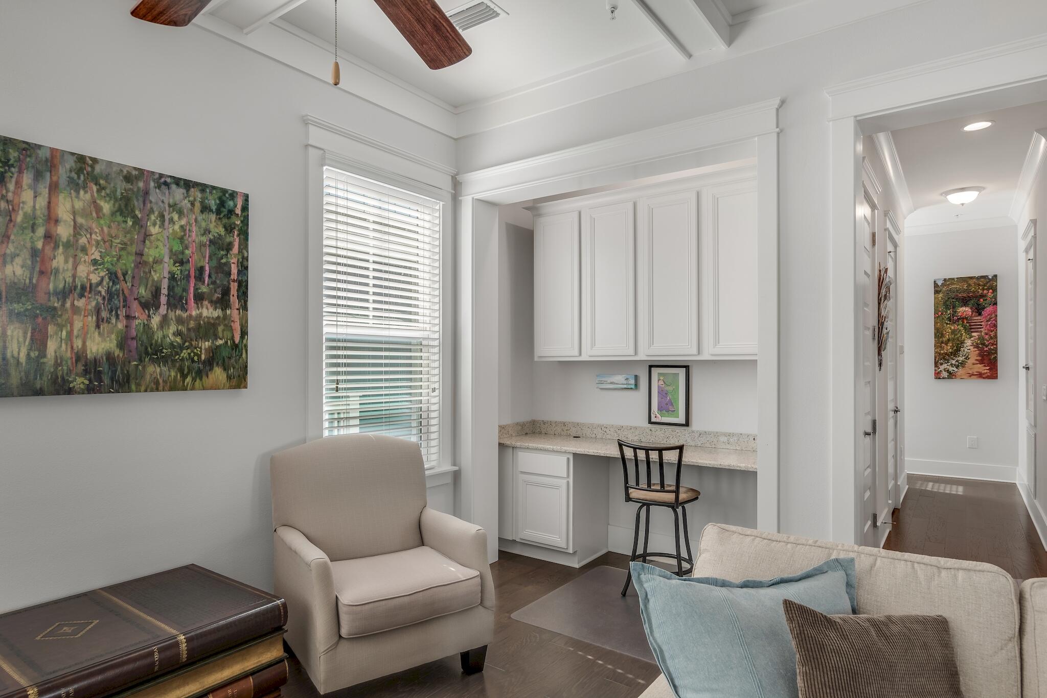 128 Emerald Beach Circle Santa Rosa Beach, FL 32459 - Photo 14 of 48 a living room with furniture a lamp and a window