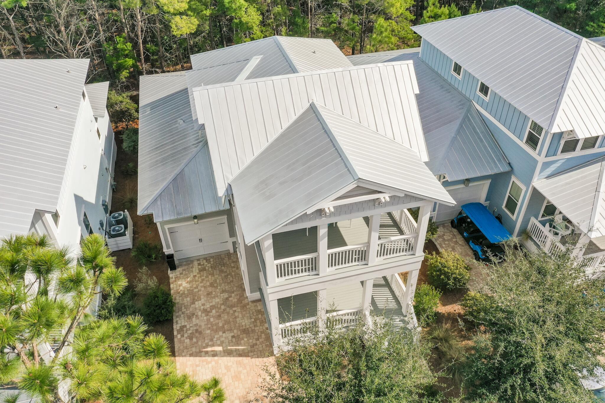 128 Emerald Beach Circle Santa Rosa Beach, FL 32459 - Photo 2 of 48 a aerial view of a house with a garden