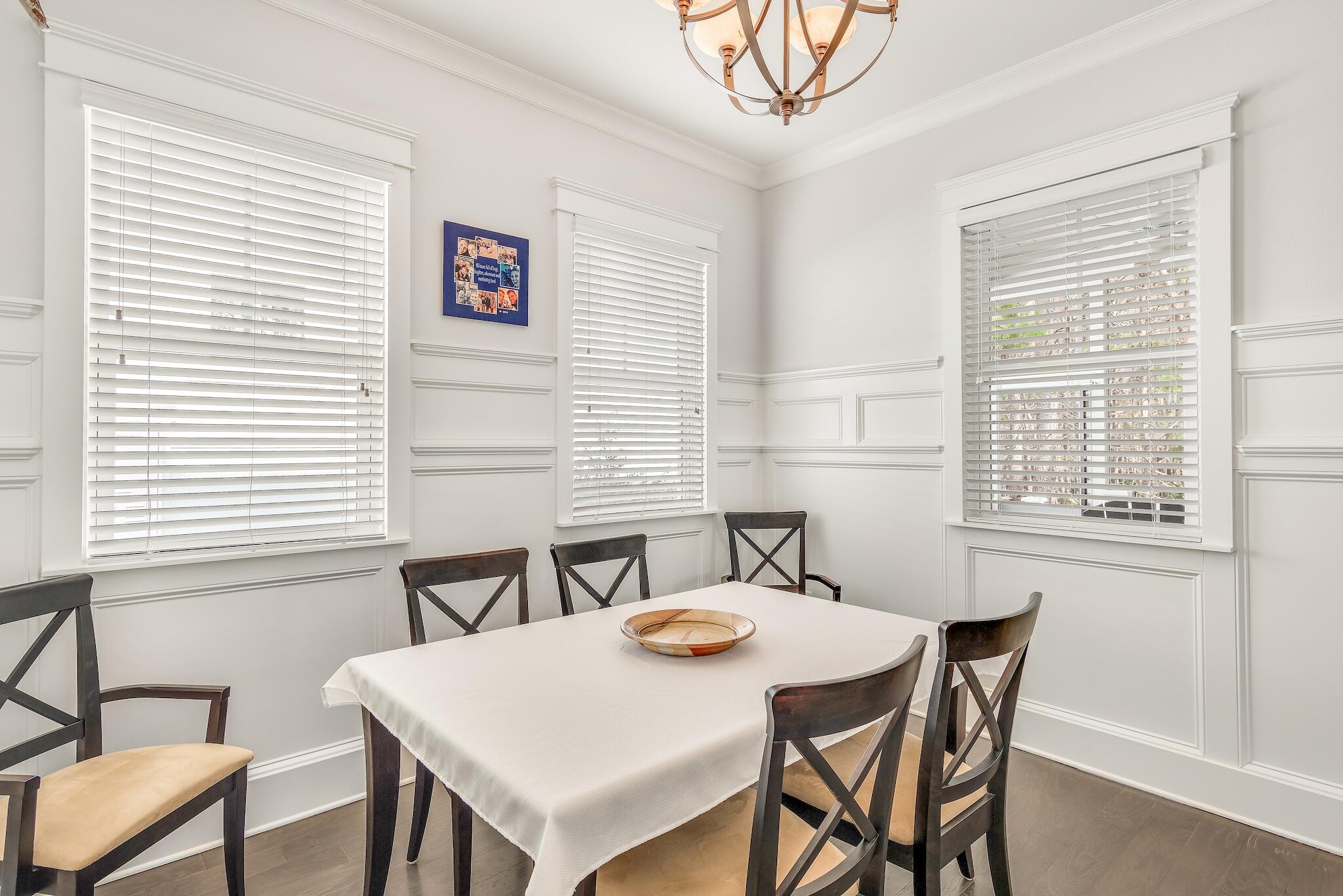 128 Emerald Beach Circle Santa Rosa Beach, FL 32459 - Photo 21 of 48 a view of a dining room with furniture and window