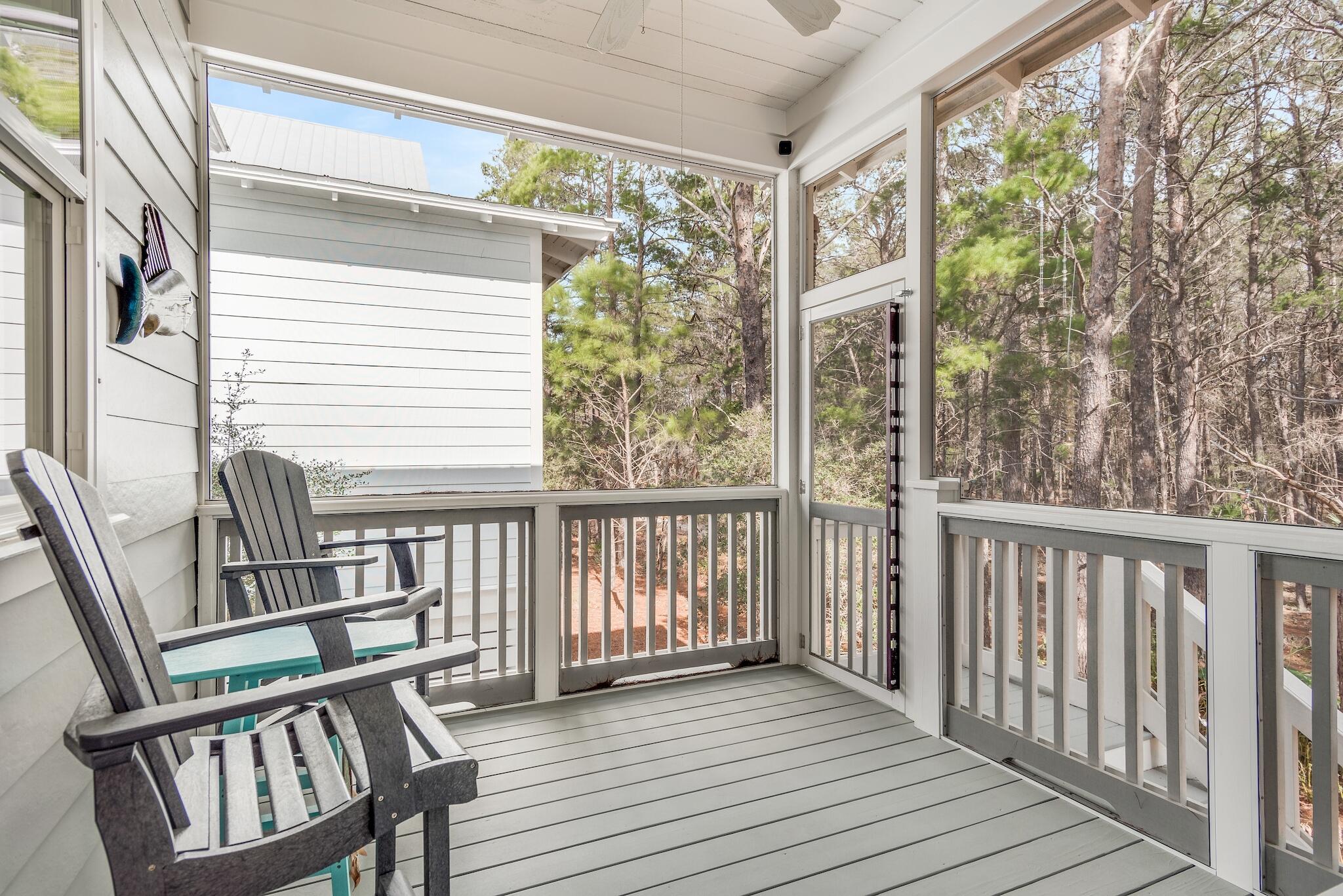 128 Emerald Beach Circle Santa Rosa Beach, FL 32459 - Photo 22 of 48 a view of a two chairs in the balcony