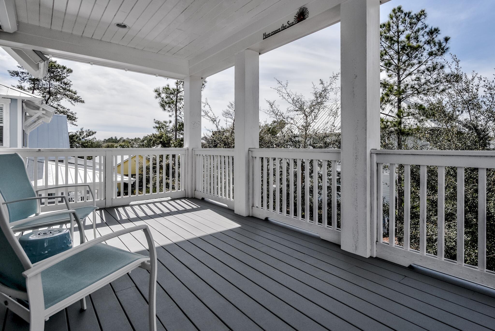 128 Emerald Beach Circle Santa Rosa Beach, FL 32459 - Photo 31 of 48 a view of a balcony with wooden floor