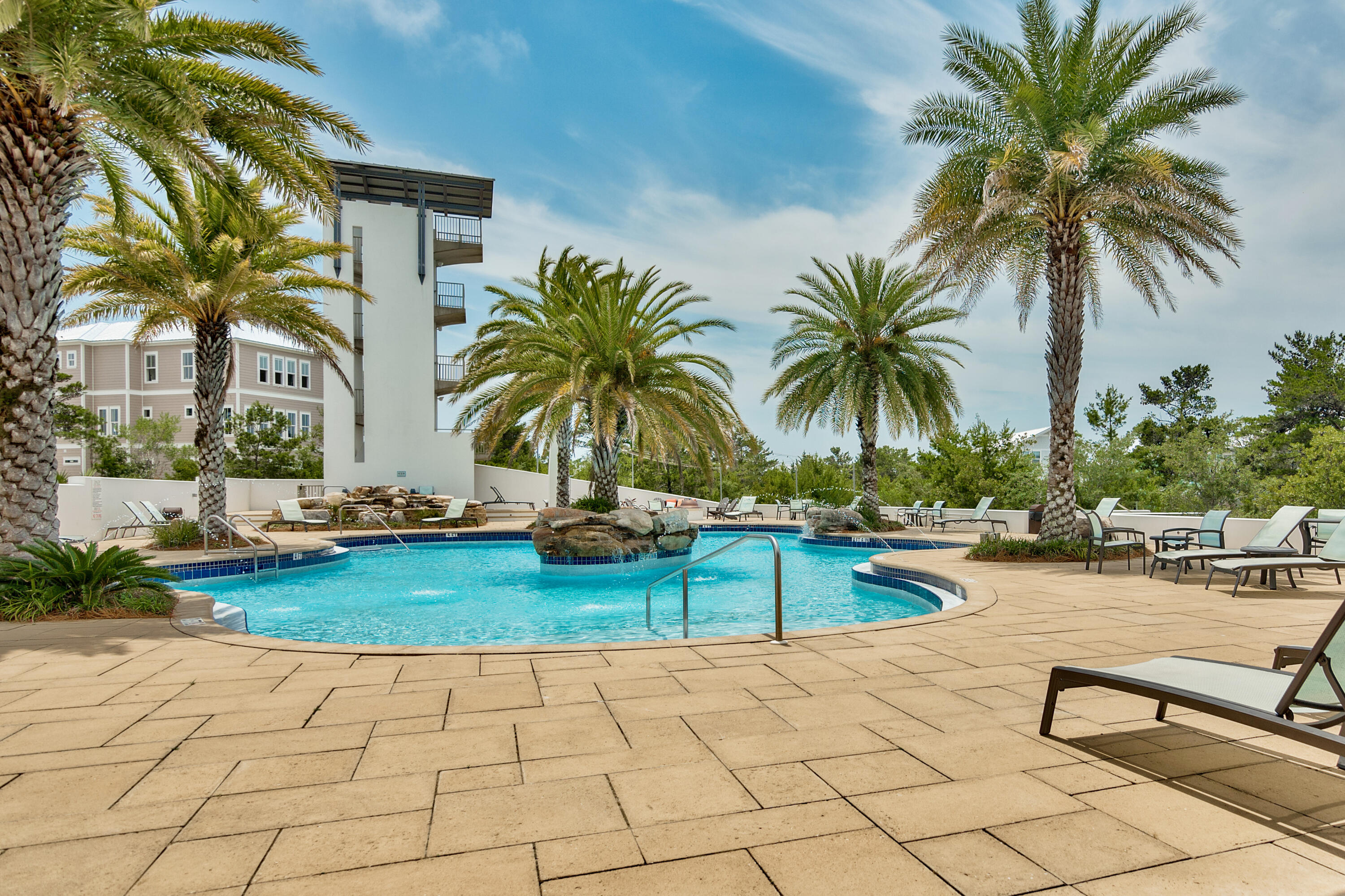 128 Emerald Beach Circle Santa Rosa Beach, FL 32459 - Photo 40 of 48 a view of swimming pool with outdoor seating and plants