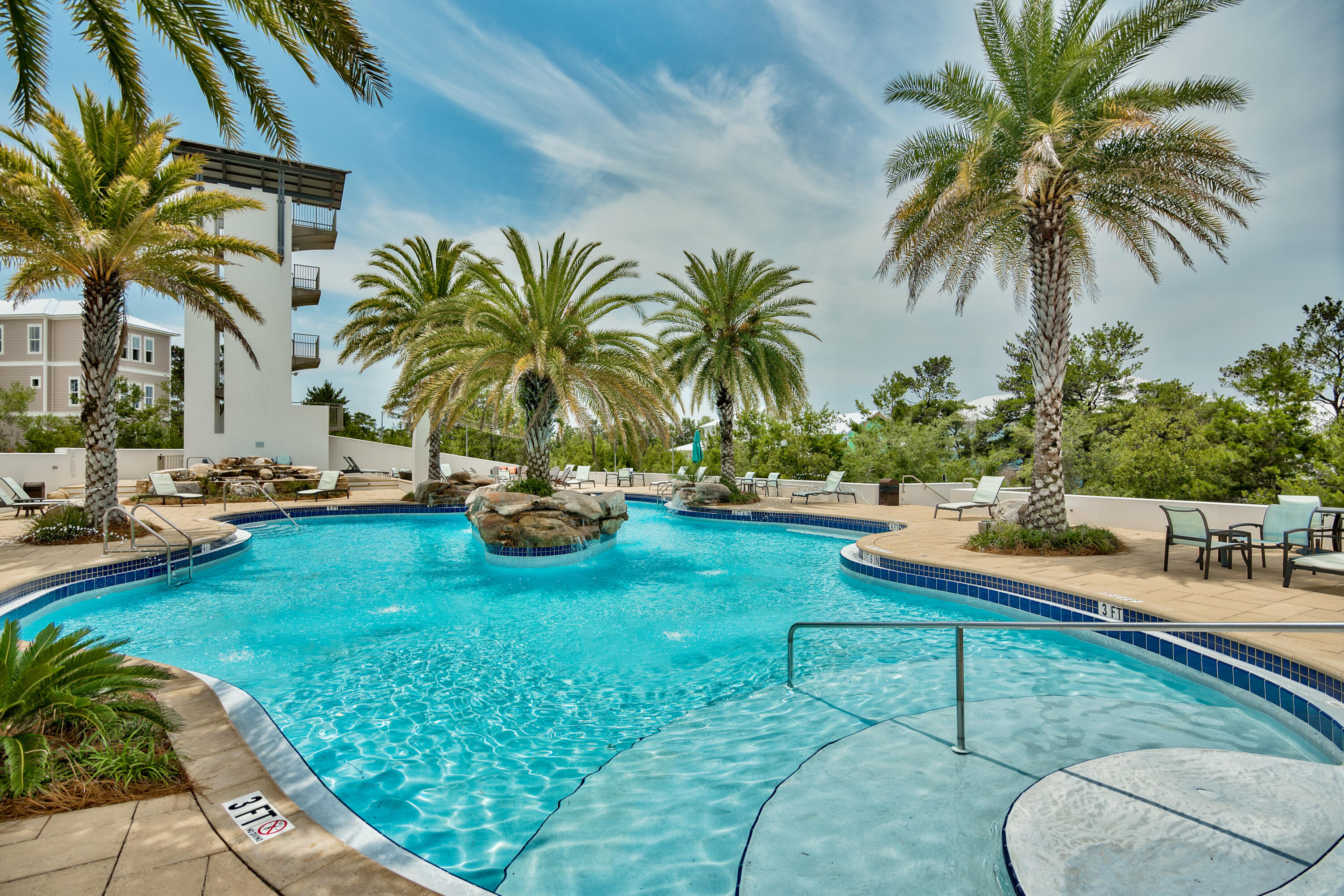 128 Emerald Beach Circle Santa Rosa Beach, FL 32459 - Photo 44 of 48 a view of a backyard with swimming pool and chairs