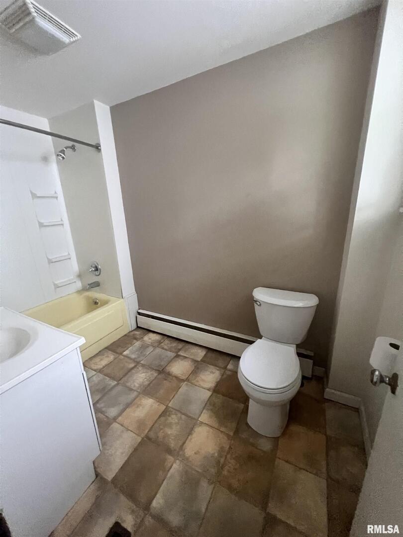 307 Morgan Street Anna, IL 62906 - Photo 9 of 15 a bathroom with a sink and a toilet