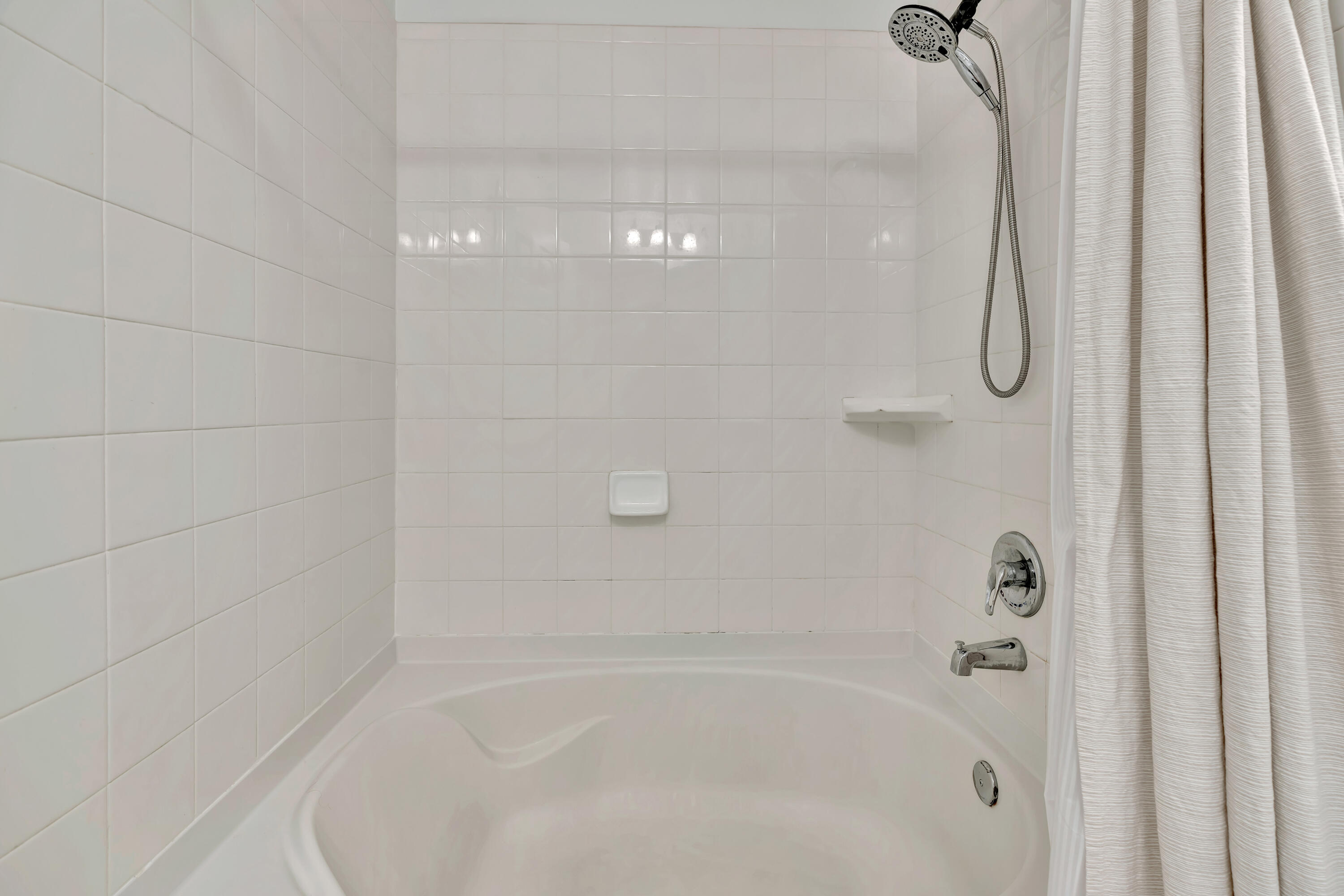 1561 Southeast Pomeroy Street Stuart, FL 34997 - Photo 19 of 25 a close up of a bathtub