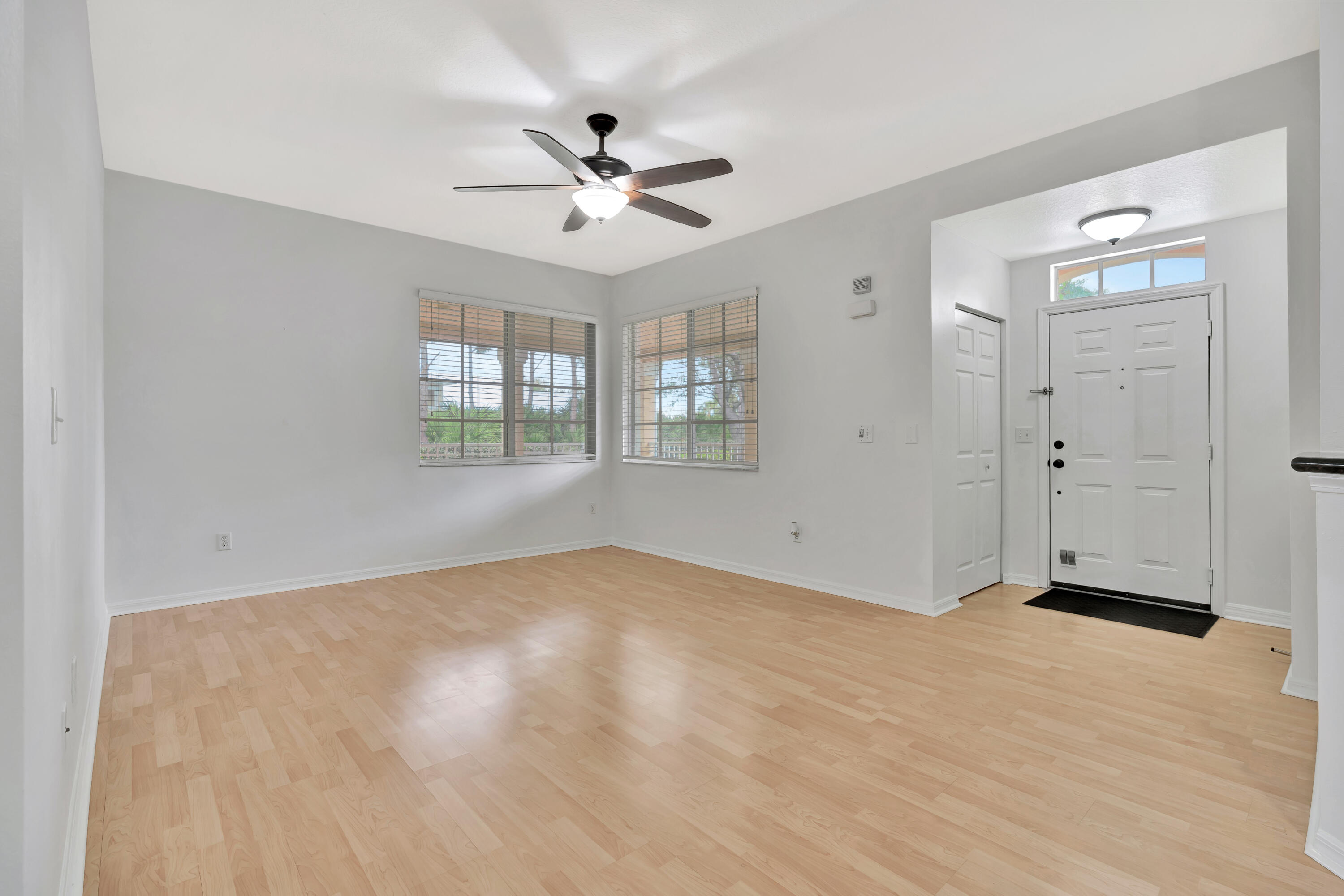 1561 Southeast Pomeroy Street Stuart, FL 34997 - Photo 4 of 25 a view of an empty room with a window