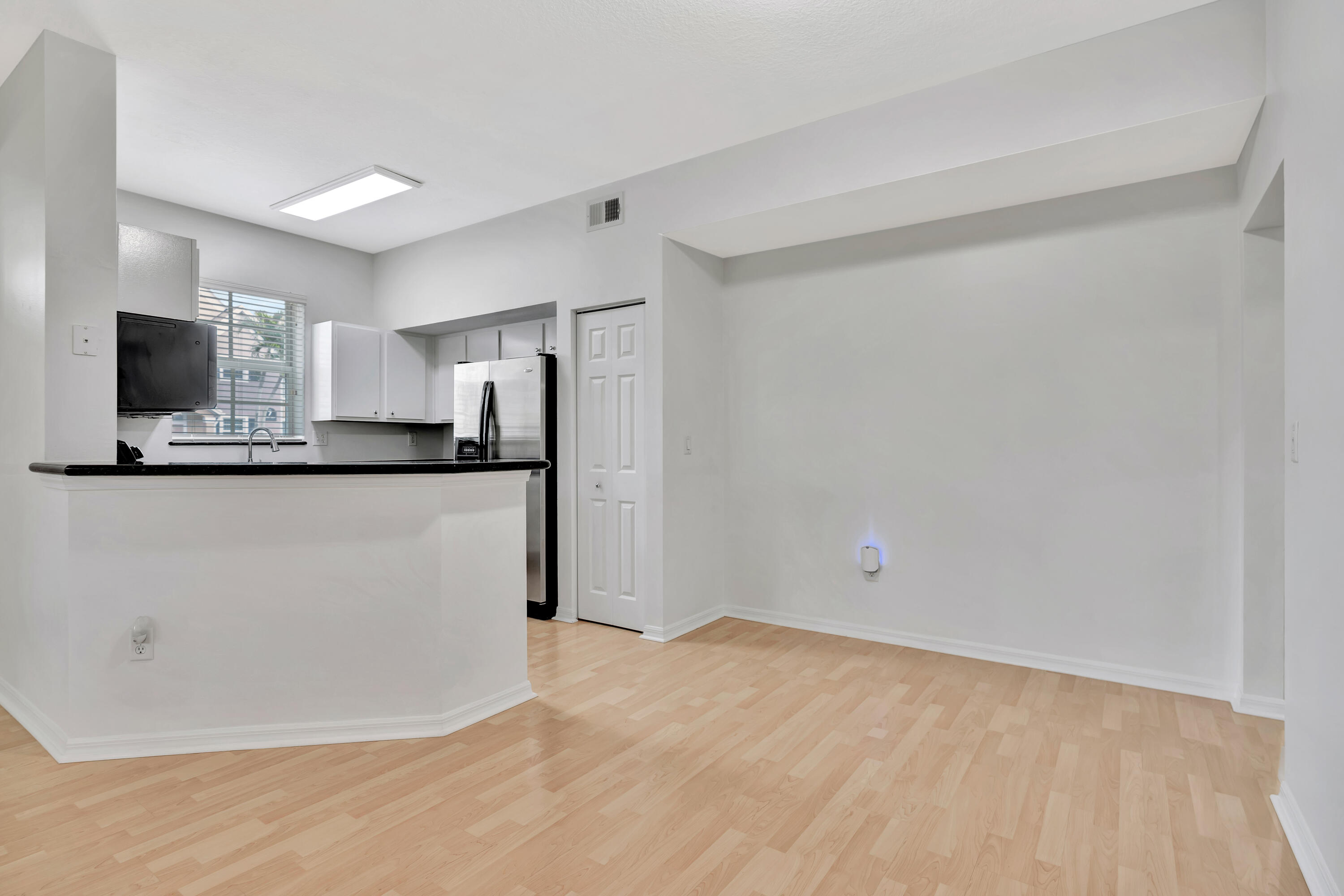 1561 Southeast Pomeroy Street Stuart, FL 34997 - Photo 7 of 25 a view of a kitchen with a sink