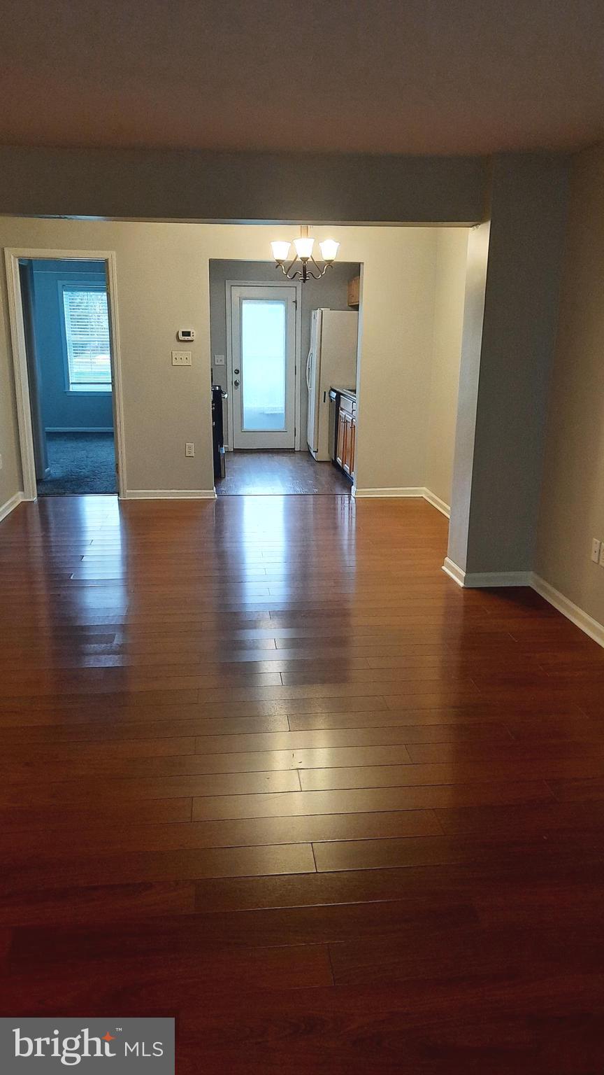 306 Sherman Avenue Carlisle, PA 17013 - Photo 2 of 11 a view of empty room with wooden floor