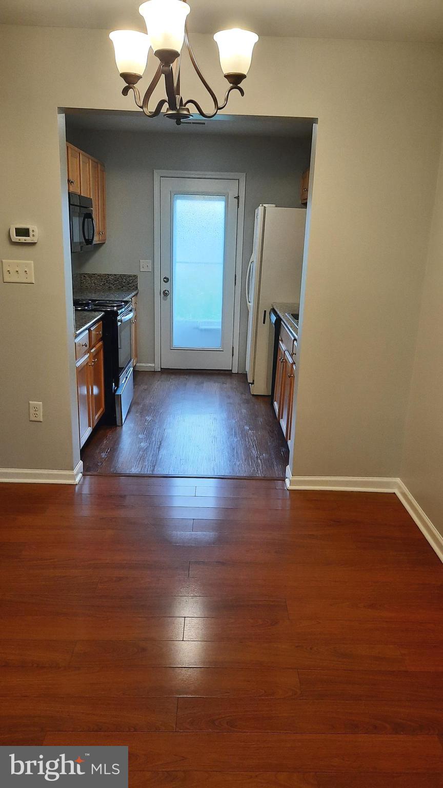 306 Sherman Avenue Carlisle, PA 17013 - Photo 3 of 11 a view of a livingroom with wooden floor