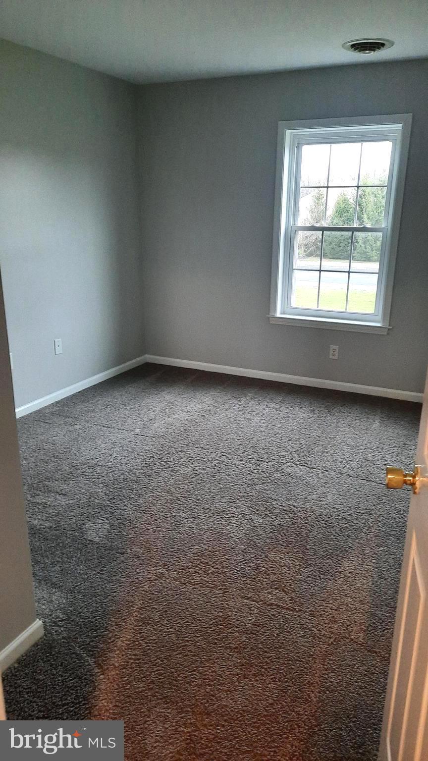 306 Sherman Avenue Carlisle, PA 17013 - Photo 7 of 11 an empty room with a window