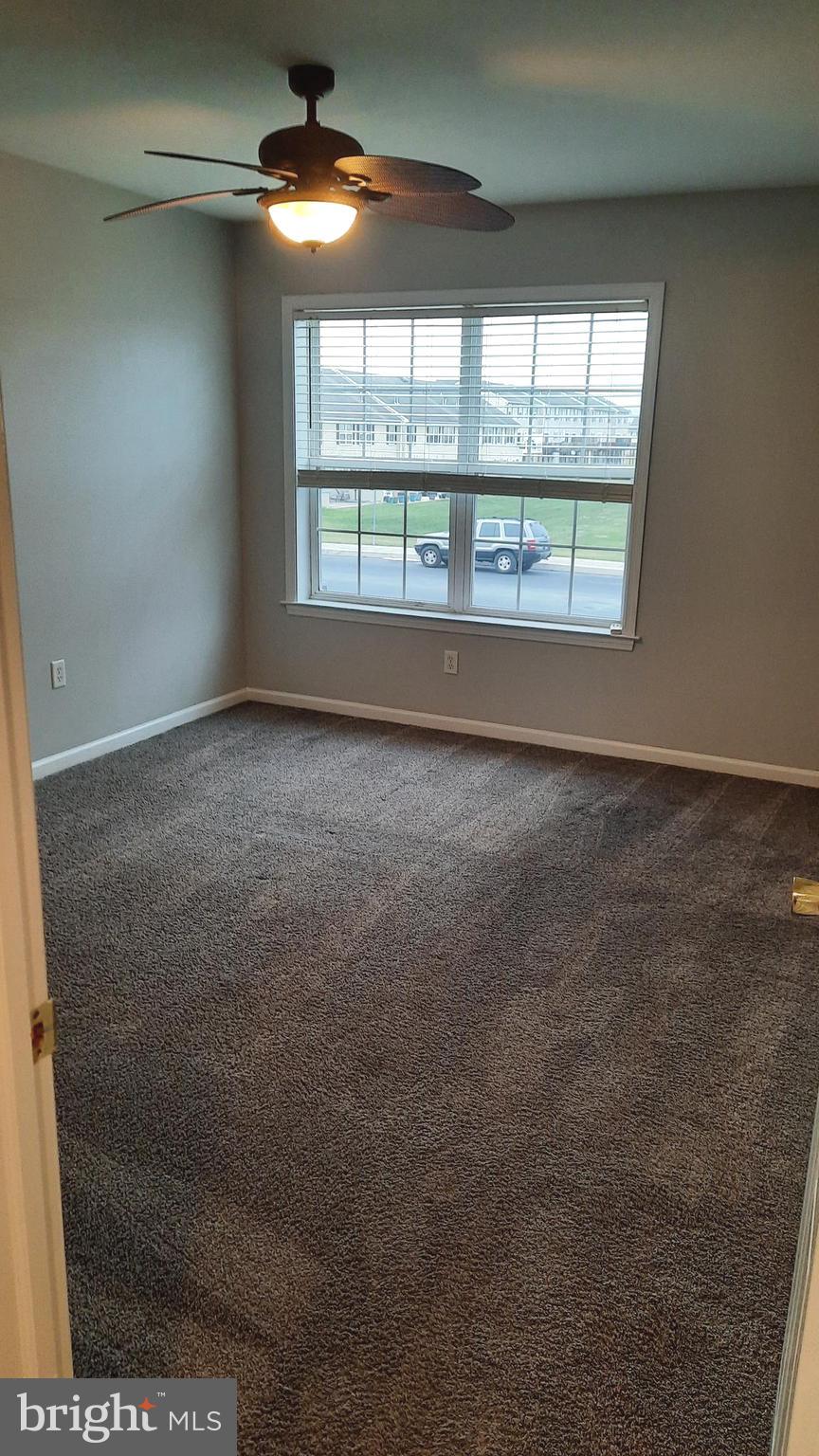 306 Sherman Avenue Carlisle, PA 17013 - Photo 10 of 11 an empty room with windows