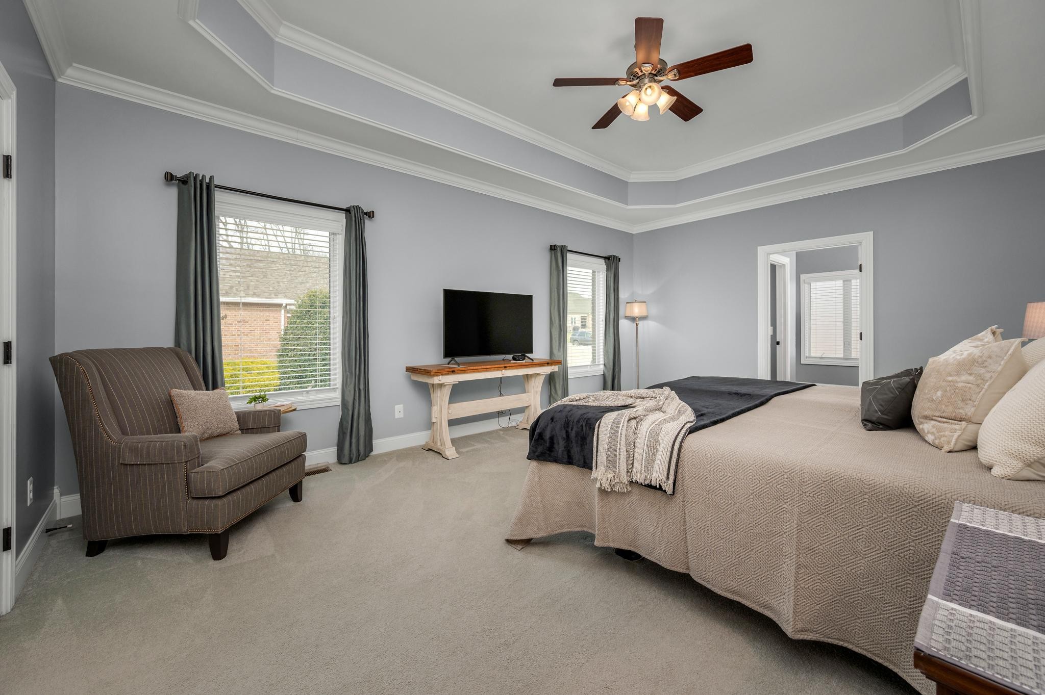 290 Cascade Drive Winchester, TN 37398 - Photo 30 of 68 a bedroom with bed couches and a flat tv screen