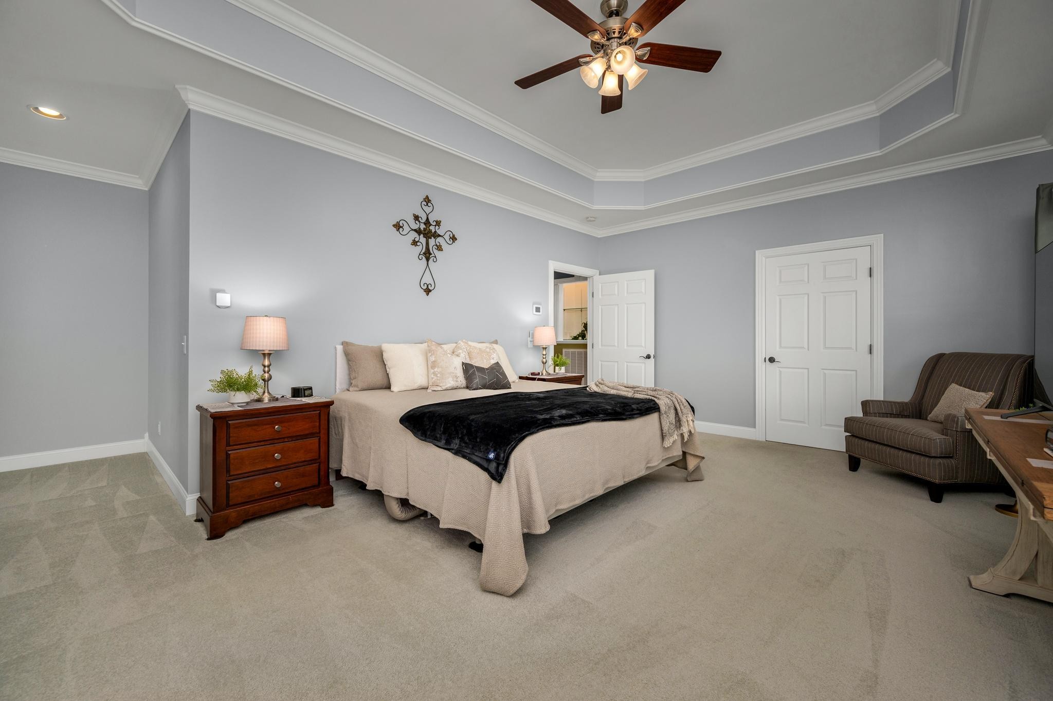 290 Cascade Drive Winchester, TN 37398 - Photo 31 of 68 a spacious bedroom with a bed and a chandelier